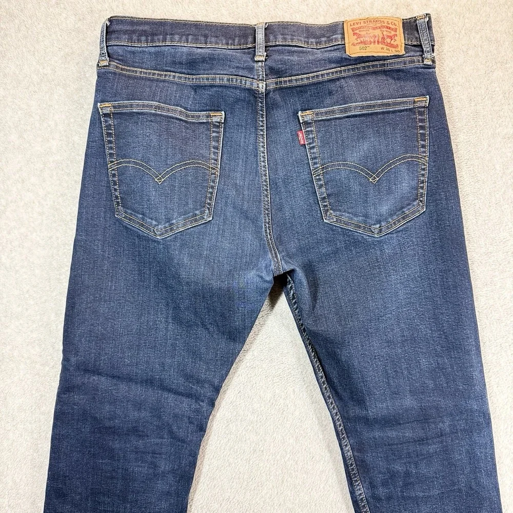 Levis 502‎ Jeans Mens 36x28 Blue Regular Tapered Mid Rise Stretch Dark Wash